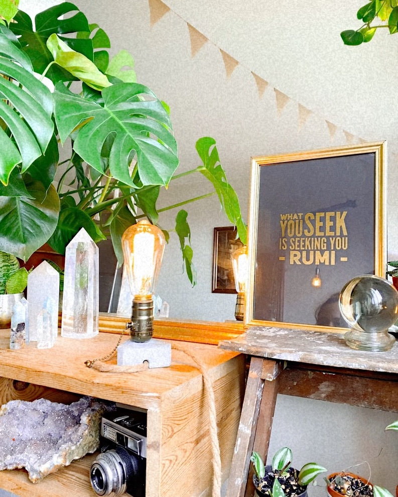 Handmade triangular concrete lamp base with a glowing Edison filament bulb - Let's Jam lamps, Camden Market