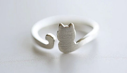 Silver open-band ring shaped like a sitting cat silhouette with a curled tail - Let's Jam jewellery collection