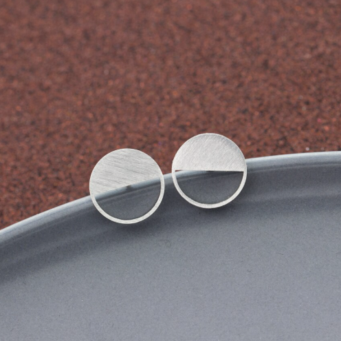 Half circle stud earring worn on the ear - Let's Jam jewellery, Camden Market