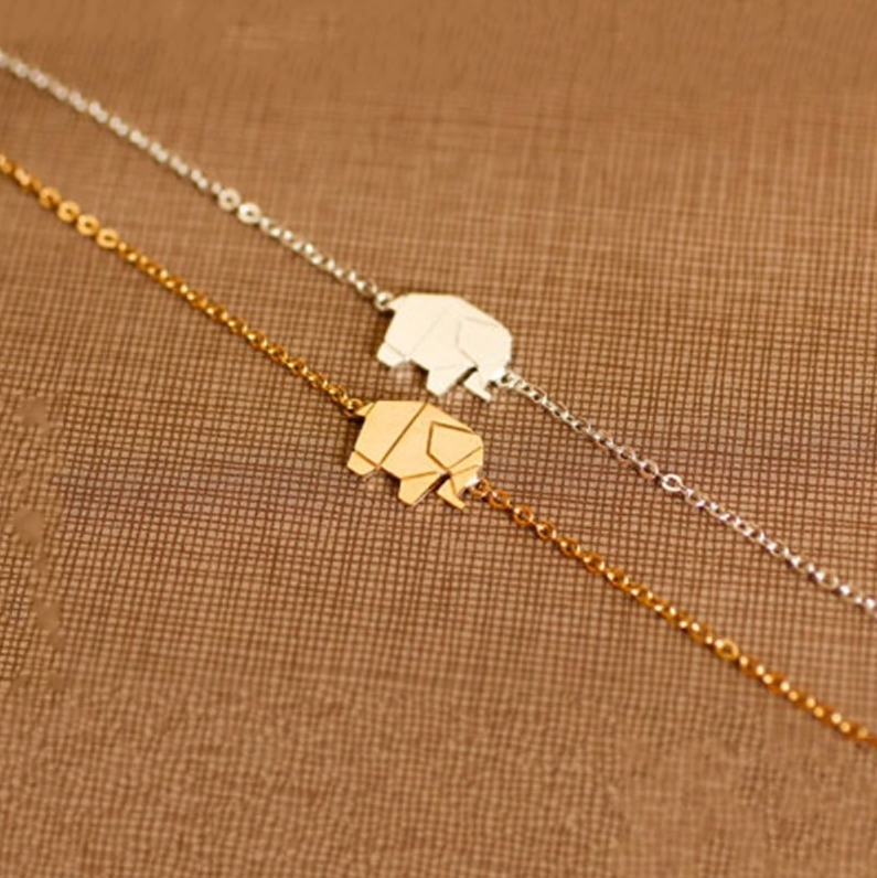 Angled view of the origami elephant charm and its chain - Let's Jam jewellery, Camden Market, London