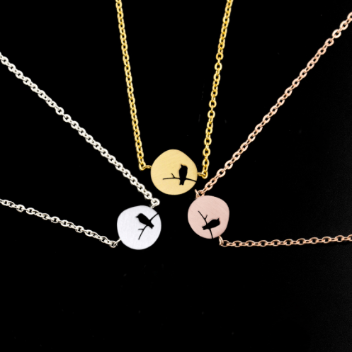 Gold bird disc charm bracelet on a fine chain - Let's Jam, Camden Market, London