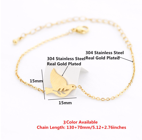 Two dove bird bracelets in different metal finishes together - Let's Jam jewellery, Camden Market