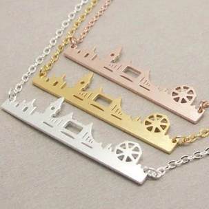 Silver London skyline charm bracelet laid flat on a fine chain - Let's Jam, Camden Market London