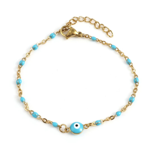 Evil eye bead bracelets draped over an open hand - Let's Jam jewellery, Camden Market