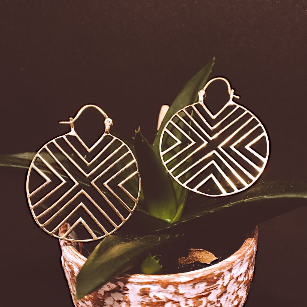 Round brass disc earrings with cut-out triangle pattern in gold - Let's Jam jewellery, Camden Market