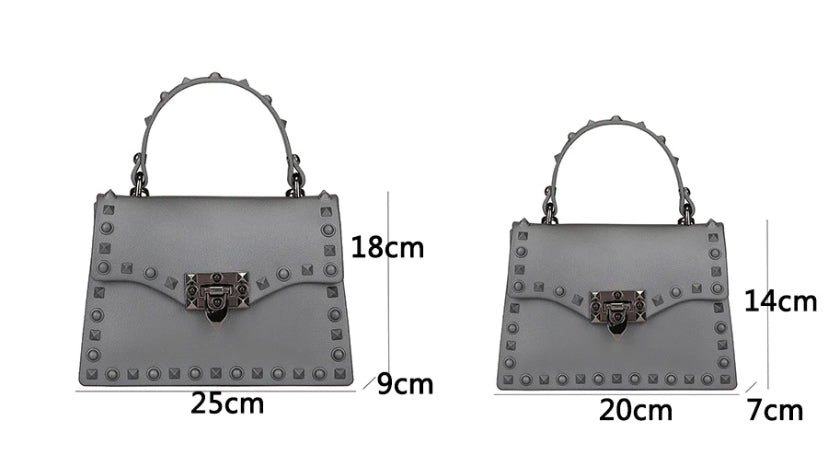 Handbag worn on the shoulder with the long strap clipped on - Let's Jam, Camden Market, London