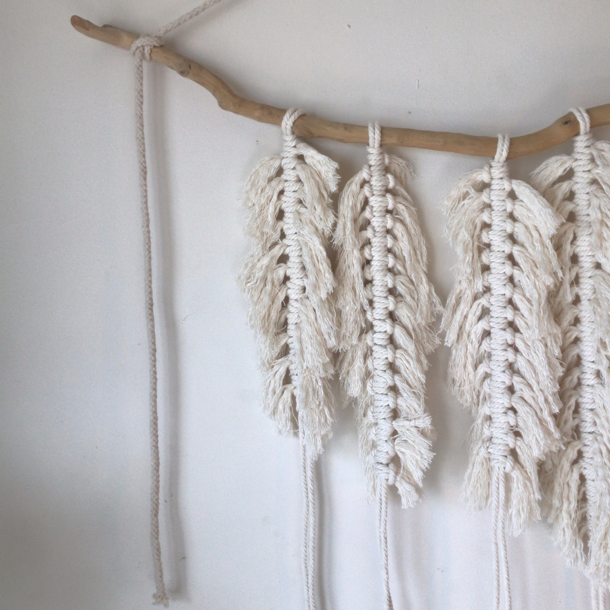 Close view of the knotted cotton cord and combed fringe on the macrame - Let's Jam, Camden Town