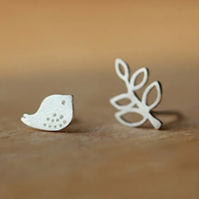 Load image into Gallery viewer, Sterling silver bird stud earring shown close up - Let's Jam jewellery, Camden Market, London
