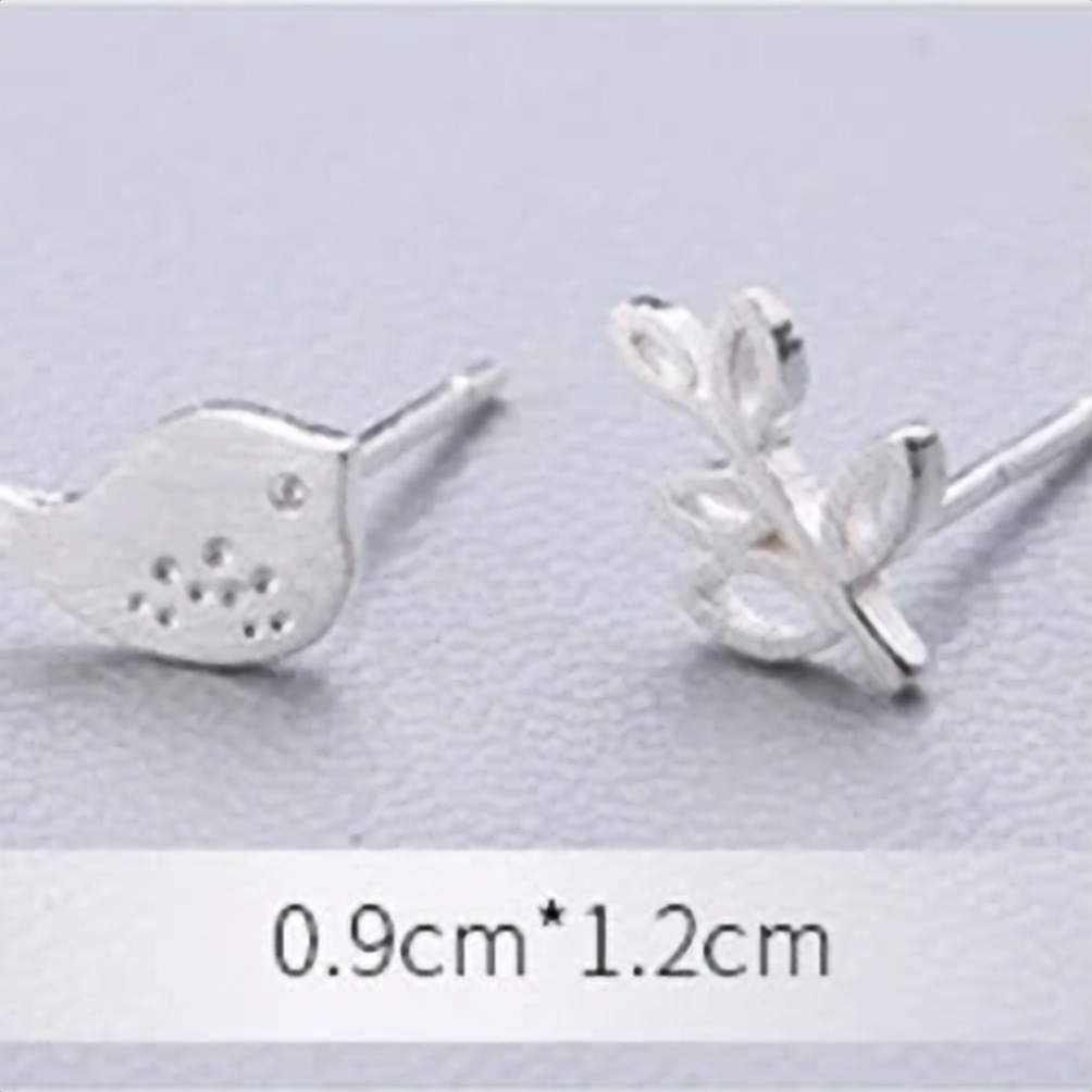 Bird and twig stud earrings photographed from above - Let's Jam, Camden Market, London