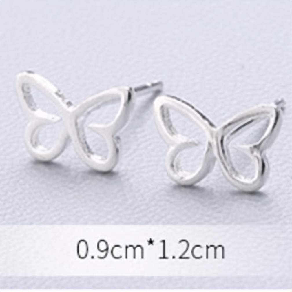 Close-up of a sterling silver open butterfly outline stud earring - Let's Jam jewellery, Camden Market London