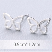 Load image into Gallery viewer, Close-up of a sterling silver open butterfly outline stud earring - Let's Jam jewellery, Camden Market London
