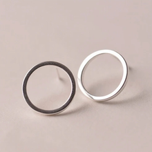Load image into Gallery viewer, 925 sterling silver hollow circle stud earrings, one oxidised black and one polished silver - Let's Jam jewellery collection
