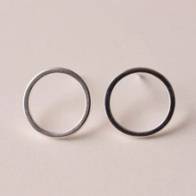 Load image into Gallery viewer, Close-up of an oxidised black circle outline stud earring - Let's Jam, Camden Town London
