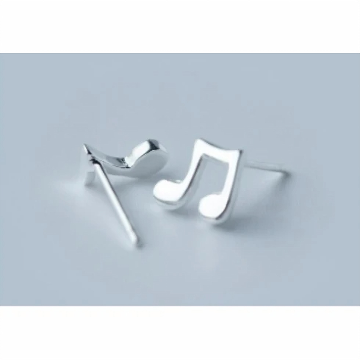 Pair of sterling silver music note studs side by side - Let's Jam jewellery, Camden Market London