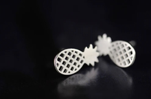 Load image into Gallery viewer, Small silver pineapple earrings photographed from above - Let's Jam jewellery, Camden Market London

